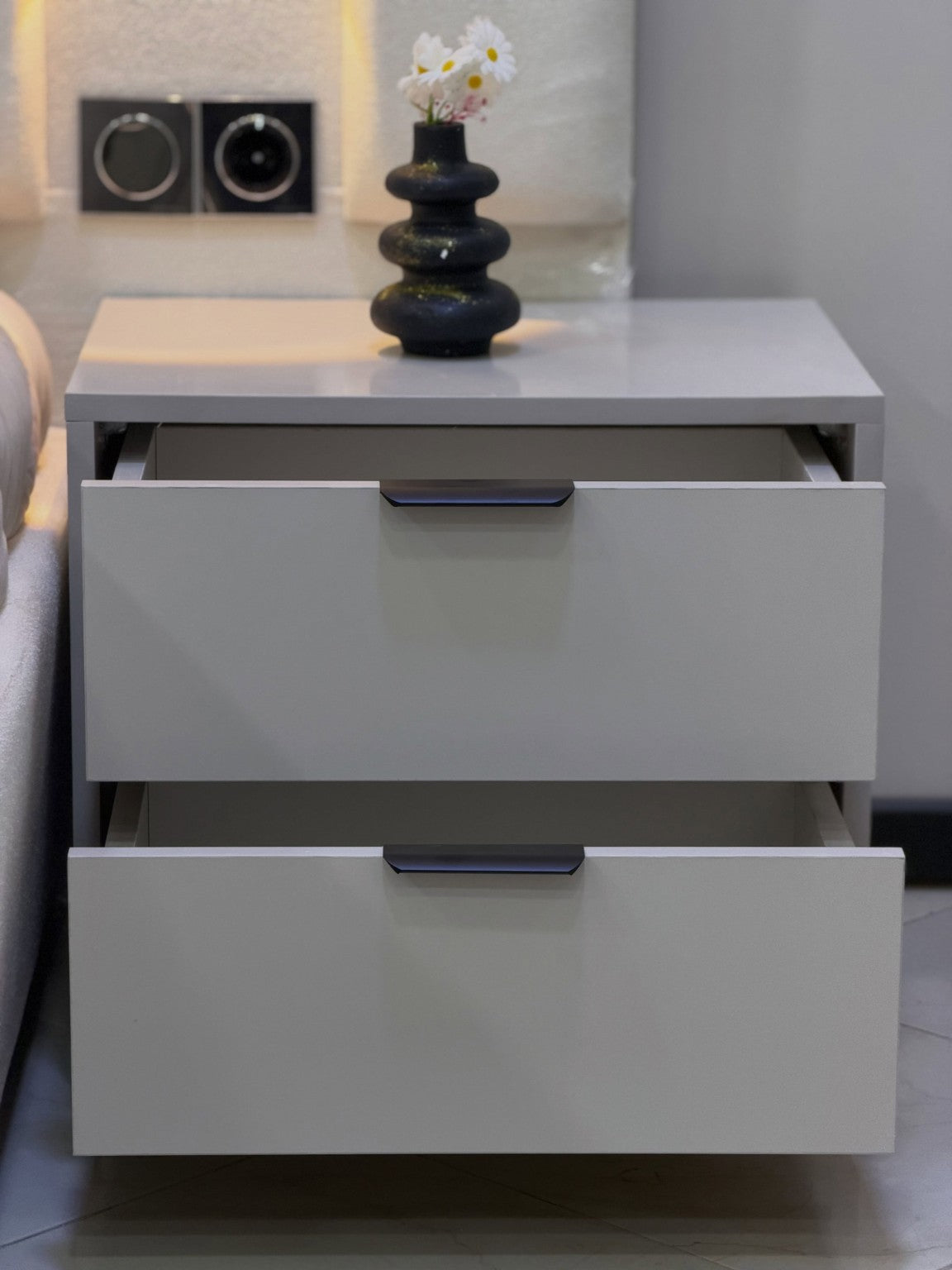 White modern two drawer commode by Tafaseel Home Decor