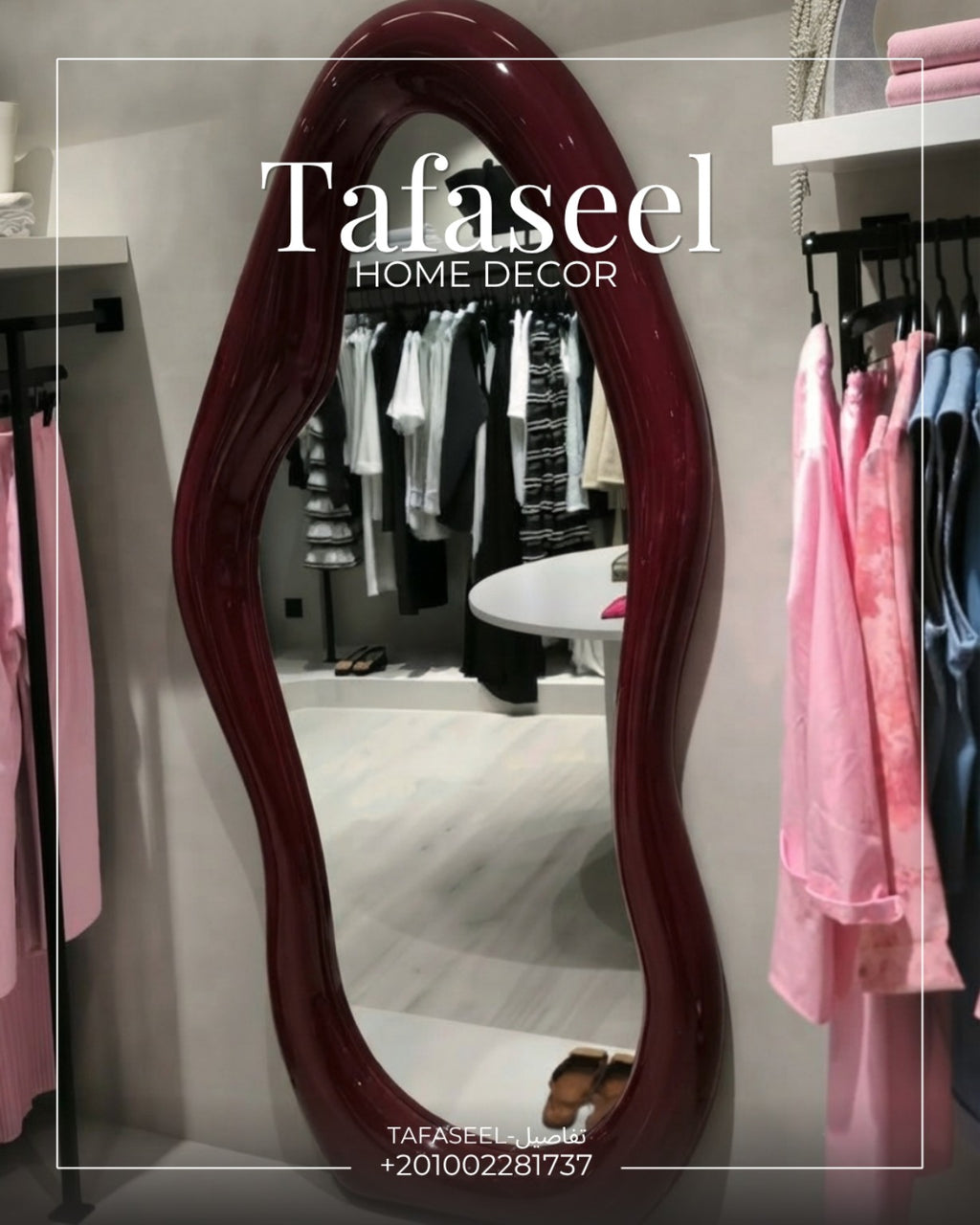Asymmetric Cloud Mirror in dark reddish wood frame in dressing room