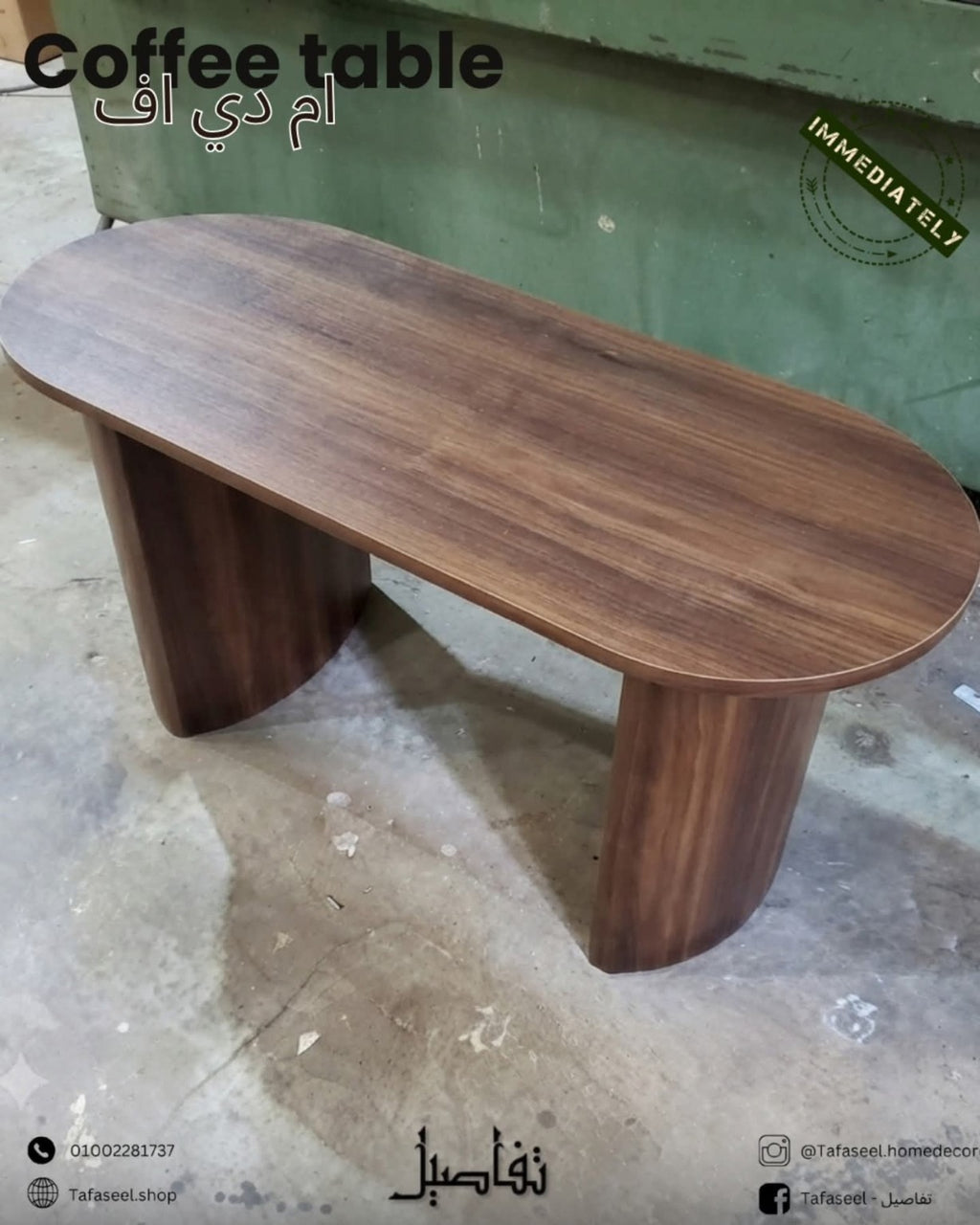 Roundy Coffee Table by Tafaseel Home Decor oval coffee table in dark wood